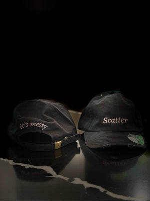 Two black Scatter dad hats side by side